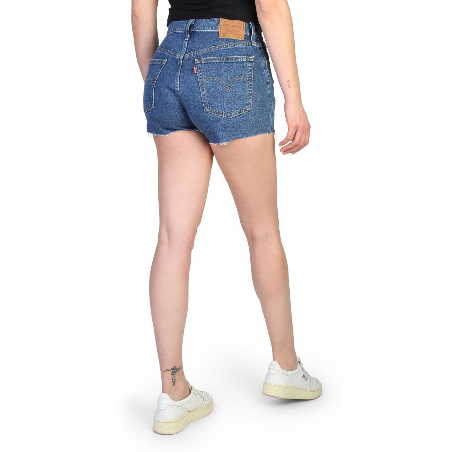 Levis women's shorts shown from the back, featuring a distressed look, perfect for casual spring/summer style.