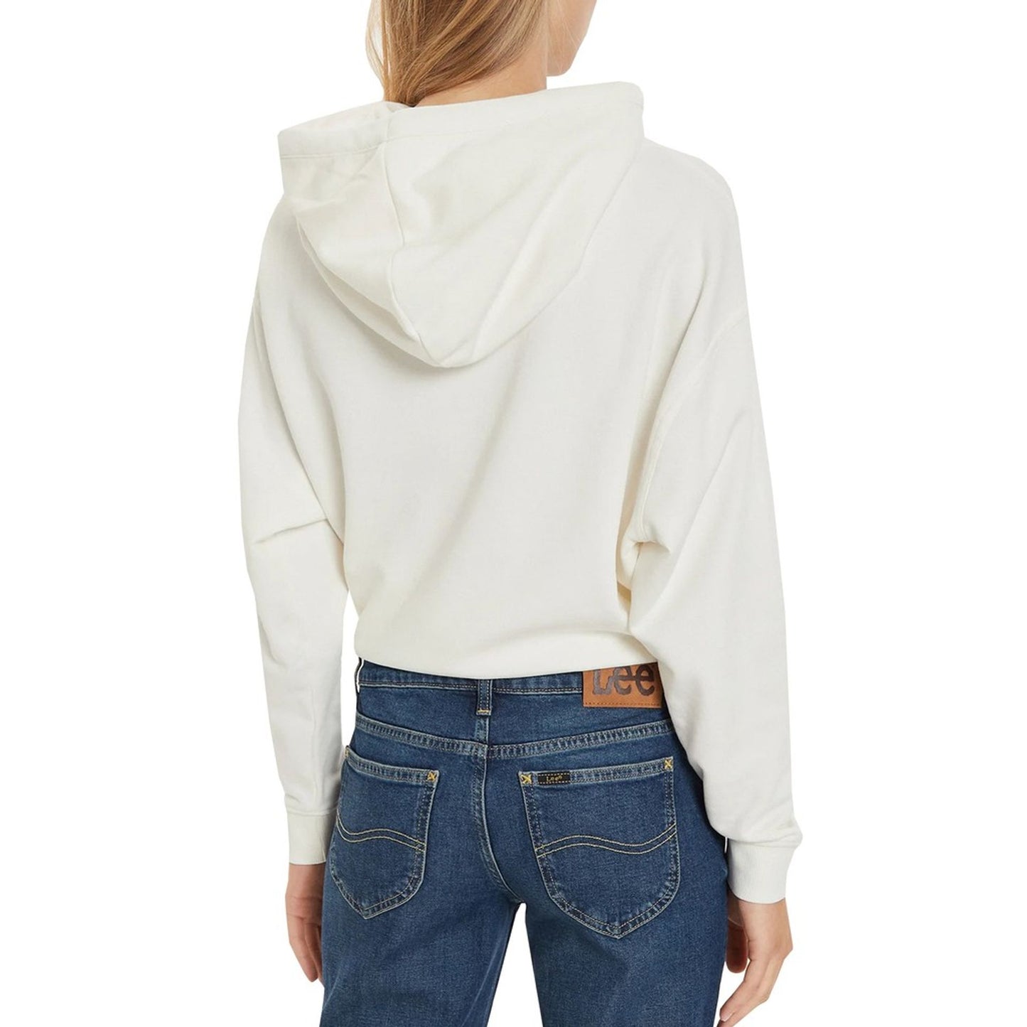 Back view of a woman wearing a white Lee sweatshirt, showcasing the hood and relaxed fit. Perfect for casual outings.