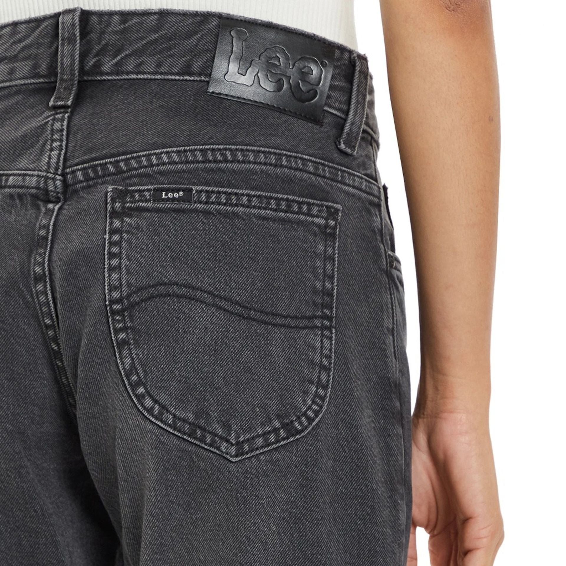 Back view of women's Lee jeans showcasing the logo and pocket details.