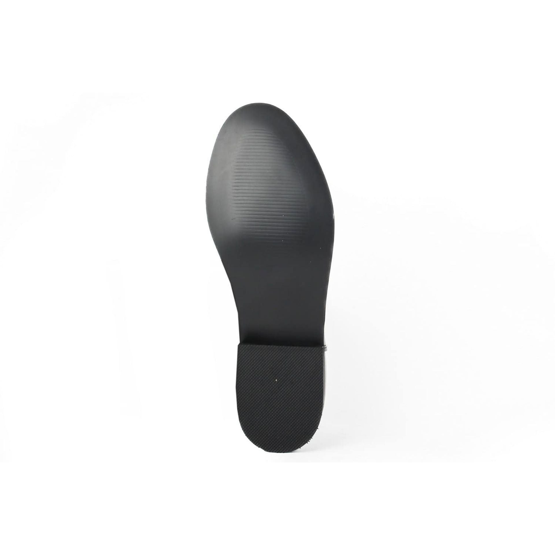 Fashion attitude boots for women sole view, showcasing the textured black rubber bottom design.